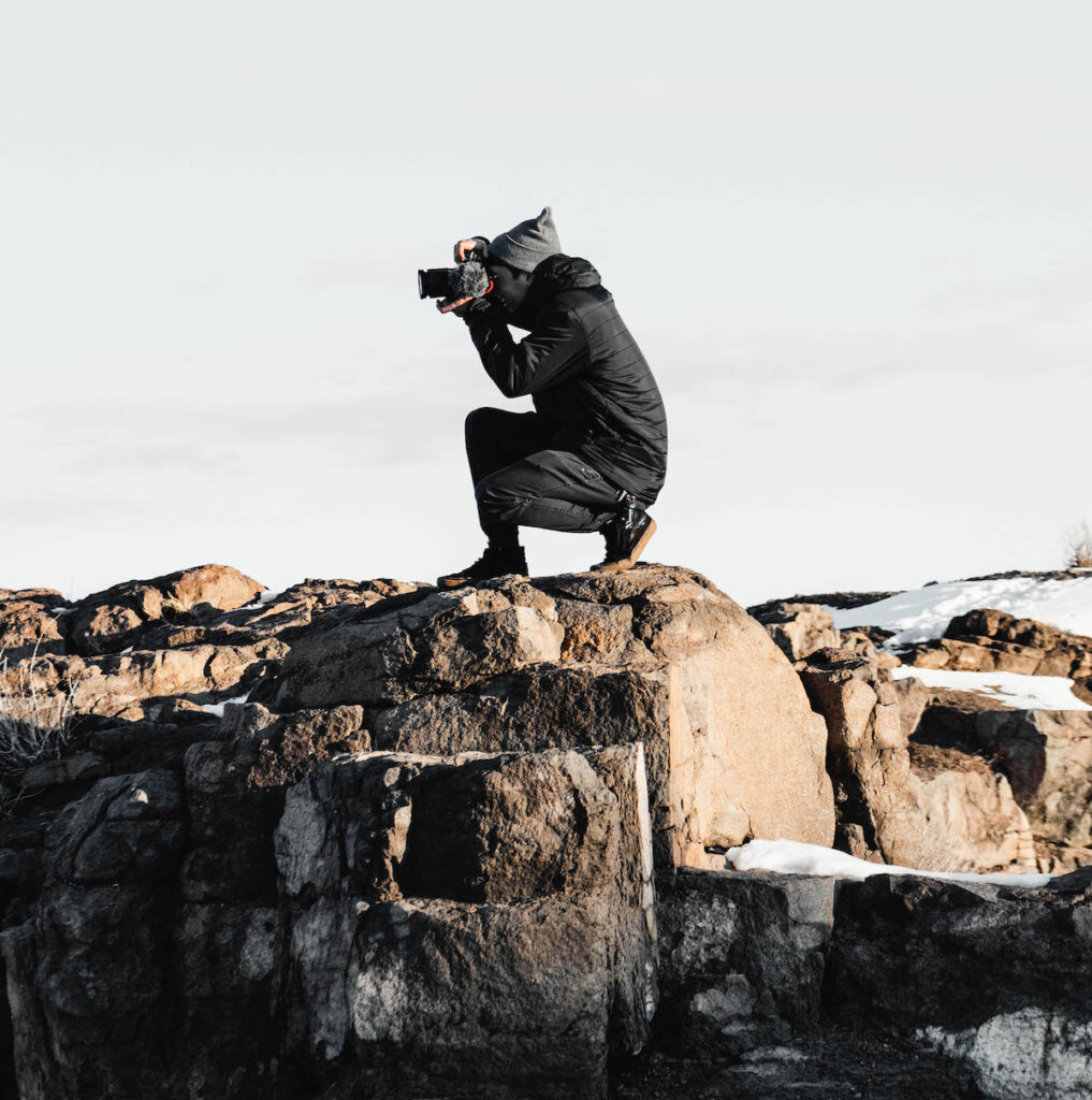 Jake Frew taking picture outside in cold