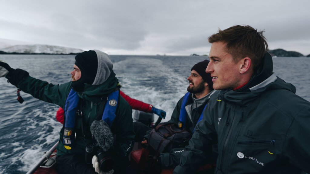 Cory Martin on boat filming with crew