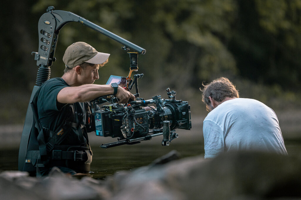 Gian Carlo Stigliano in water with camera filming