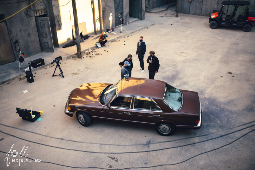 Corry Wiens filming a car