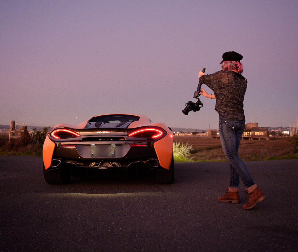 Kitty Peters filming a McLaren