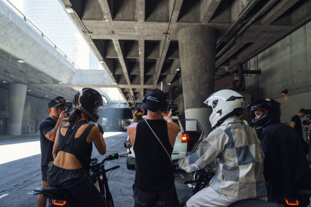 Jeremiah Davis filming with motorcyclists on highway